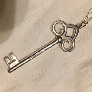 Authentic Tiffany & Co. Fleur De Lis Key Pendant Necklace